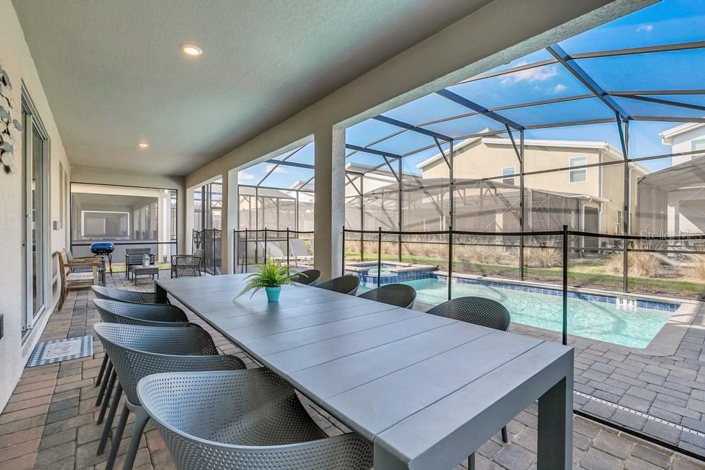 4541 Target Boulevard Kissimmee, FL 34746 - Photo 33 of 33 a dining room with a table and chairs