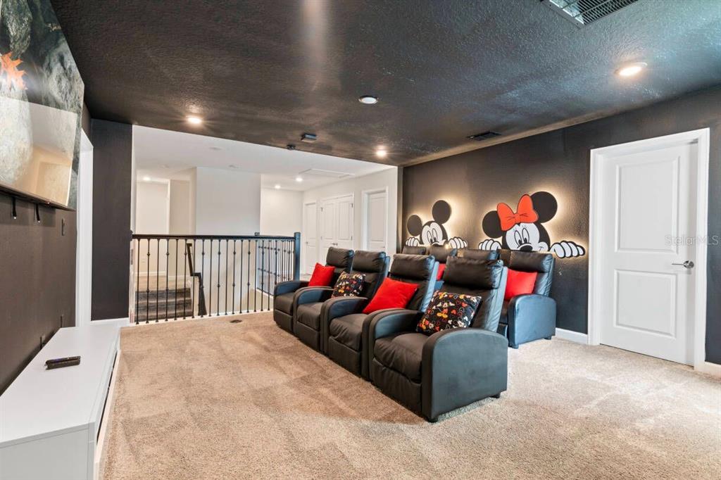 4541 Target Boulevard Kissimmee, FL 34746 - Photo 4 of 33 a living room with furniture and a flat screen tv