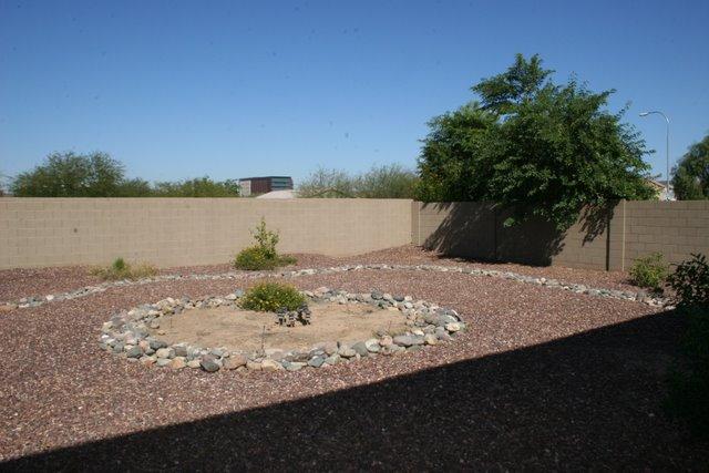 9330 West Rascon Loop Phoenix, AZ 85037 - Photo 6 of 7 backyd