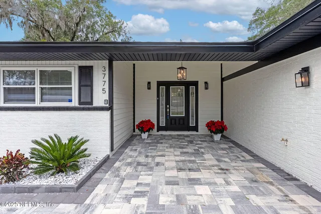 a view of a entryway door front of house