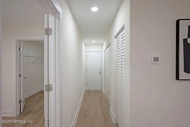 a house with trees in the background