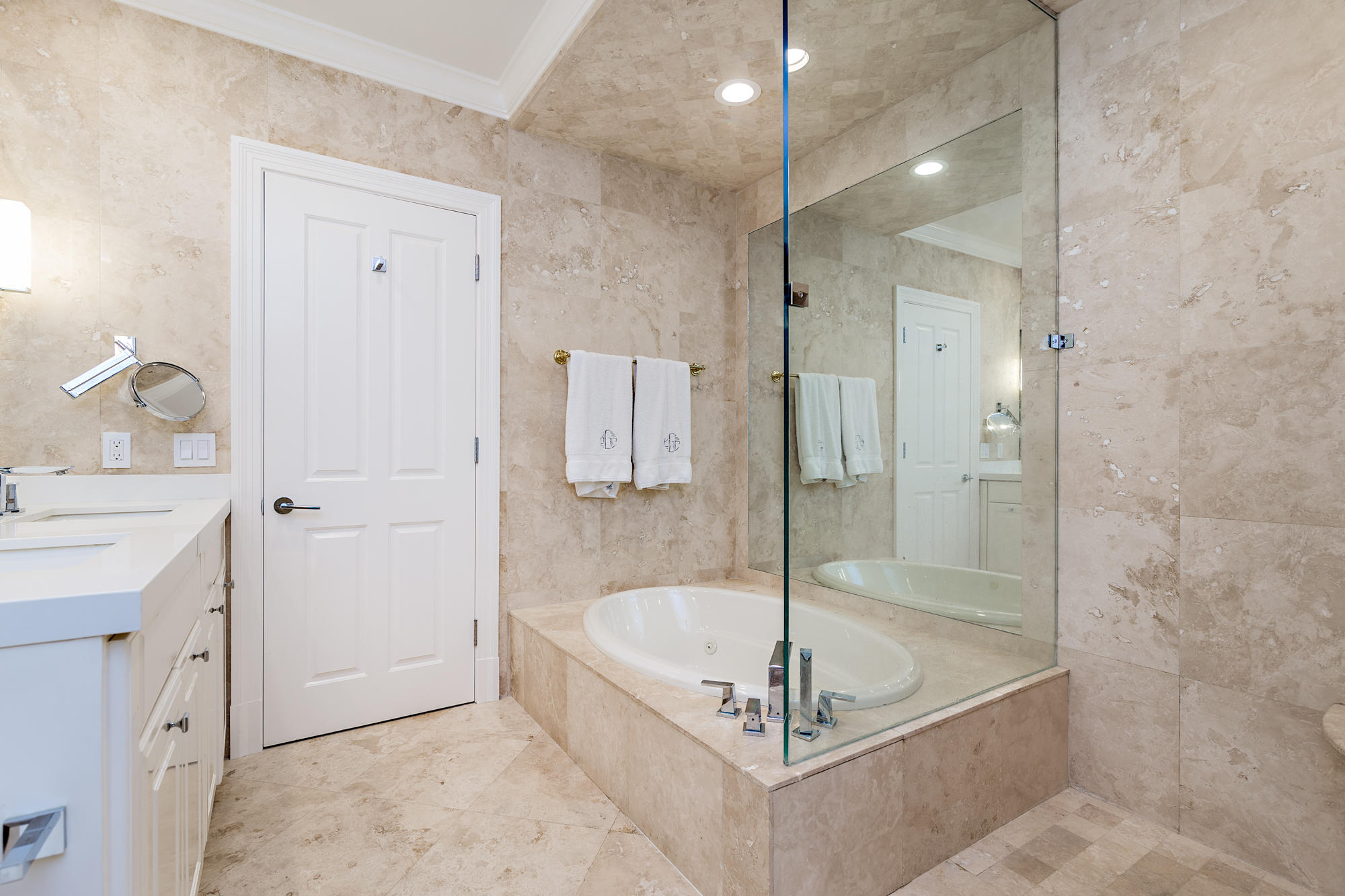 273 List Road Palm Beach, FL 33480 - Photo 12 of 26 a bathroom with a tub shower sink and mirror