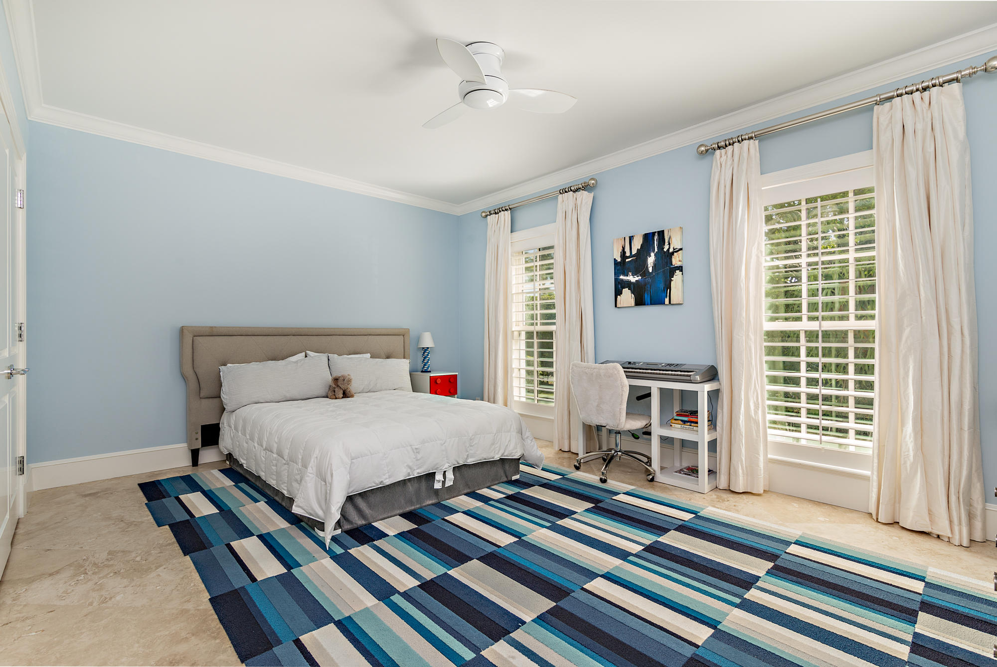 273 List Road Palm Beach, FL 33480 - Photo 14 of 26 a bedroom with a bed and a large window