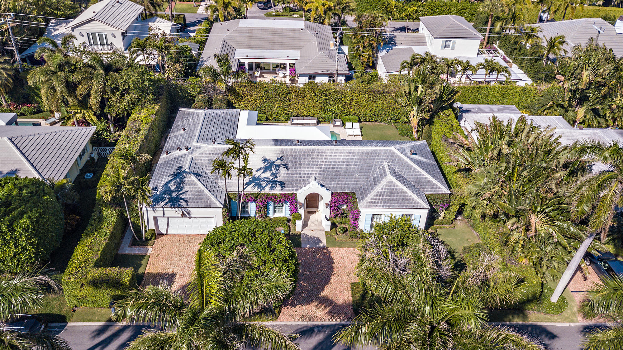 273 List Road Palm Beach, FL 33480 - Photo 23 of 26 an aerial view of multiple houses with yard