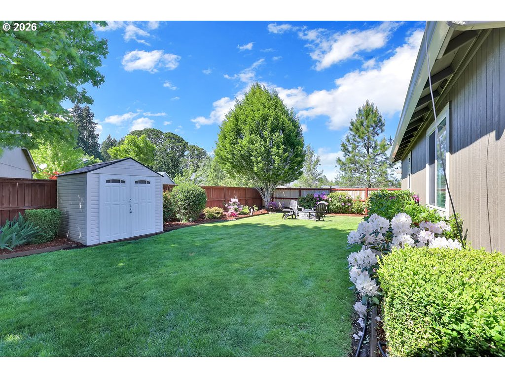 87836 8th Street Veneta, OR 97487 - Photo 21 of 25 a view of a house with a big yard and potted plants