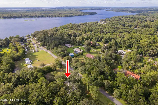a view of swimming pool with a yard and outdoor seating