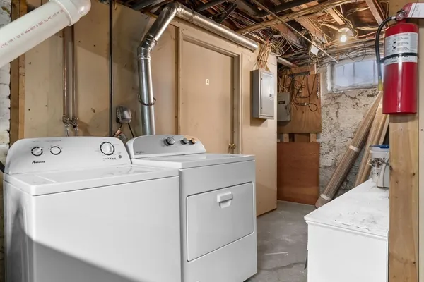 a utility room with dryer and washer