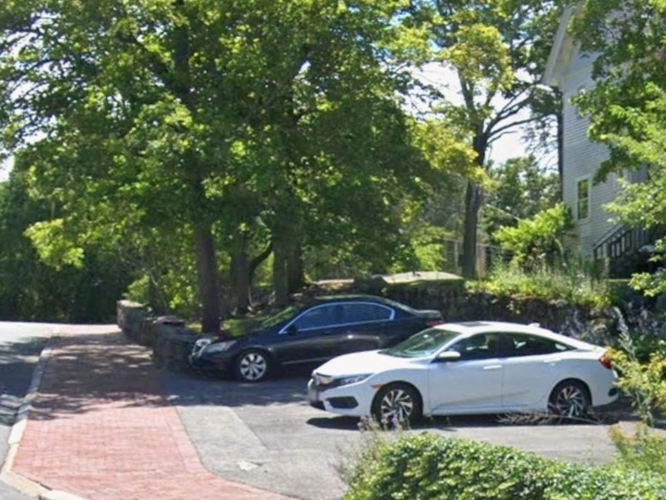 28 Columbus Avenue, Unit 4 Beverly, MA 01915 - Photo 22 of 25 a front view of a house with parking area