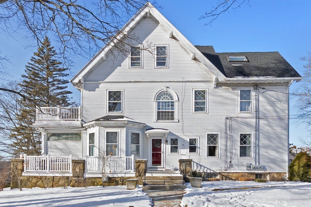 28 Columbus Avenue, Unit 4 Beverly, MA 01915 - Photo 24 of 25 a view of a white building among the street