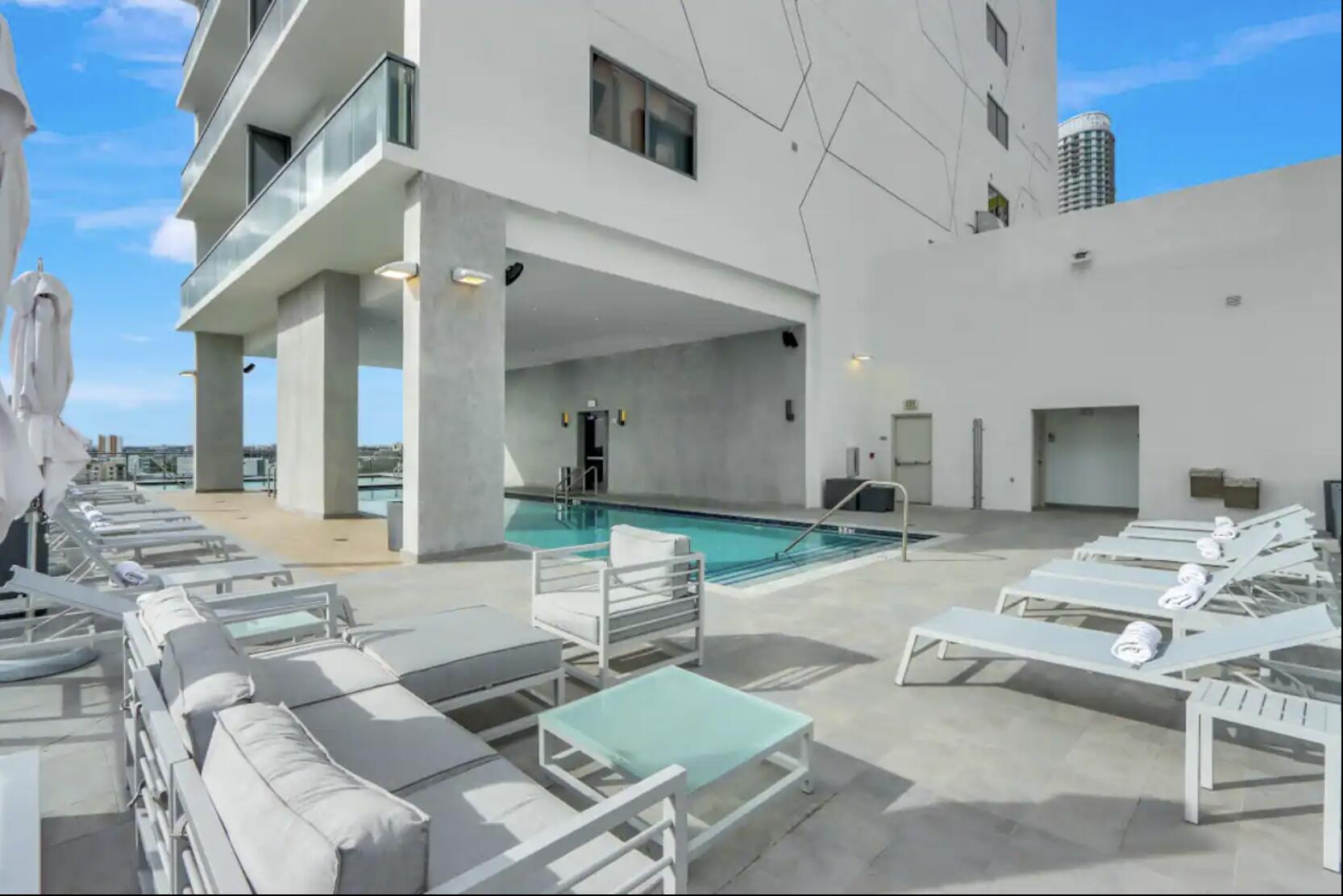 229 Southwest 9th Street, Unit 201 Miami, FL 33130 - Photo 17 of 21 a living room with furniture and a table