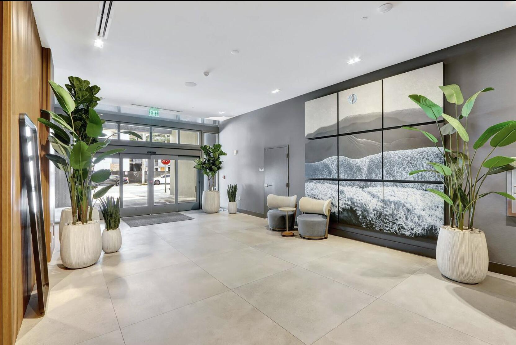 229 Southwest 9th Street, Unit 201 Miami, FL 33130 - Photo 20 of 21 a lobby with furniture and a potted plant