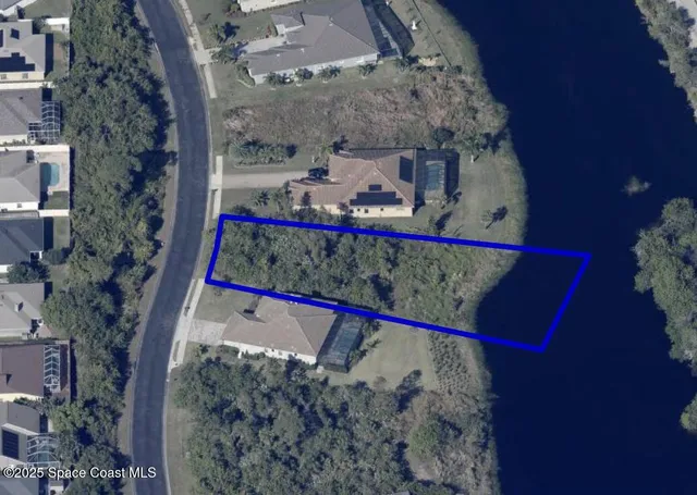 a view of door with wooden floor