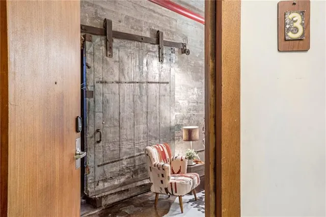 a bathroom with a shower and a sink