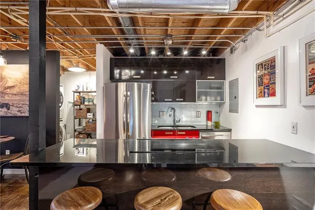 a room with furniture and wooden floor