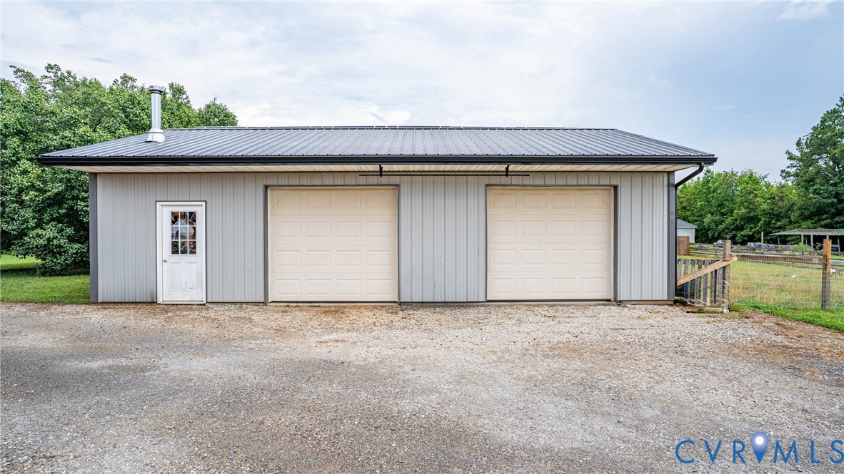 1451 Dixie Hill Road Dillwyn, VA 23936 - Photo 39 of 51 Two-bay garage with a durable metal roof, gray ver