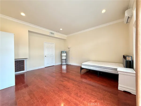 a view of livingroom with furniture and wooden floor
