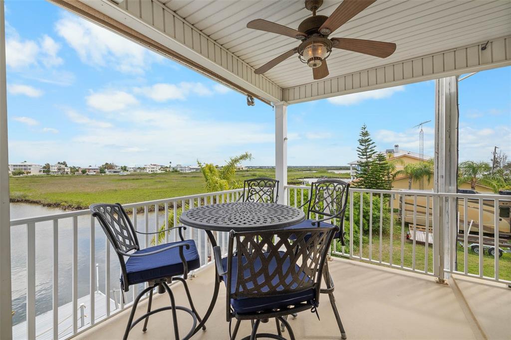 3280 Gulf Winds Circle Hernando Beach, FL 34607 - Photo 23 of 68 a view of a balcony with furniture