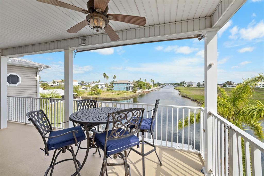 3280 Gulf Winds Circle Hernando Beach, FL 34607 - Photo 24 of 68 a view of a balcony with furniture