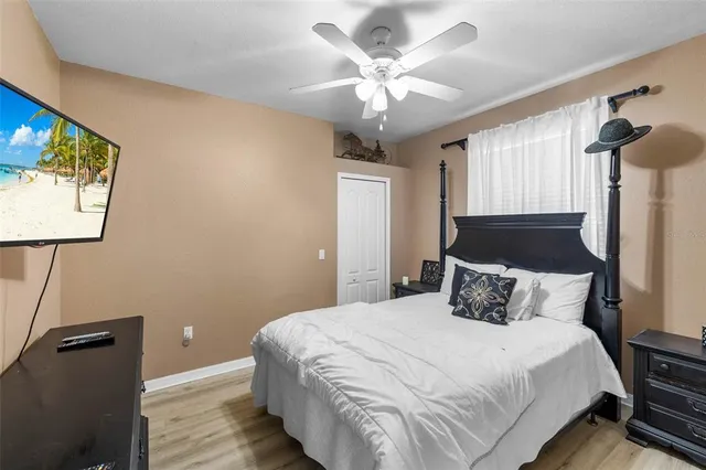 a view of staircase with lots of frames on wall and stairs