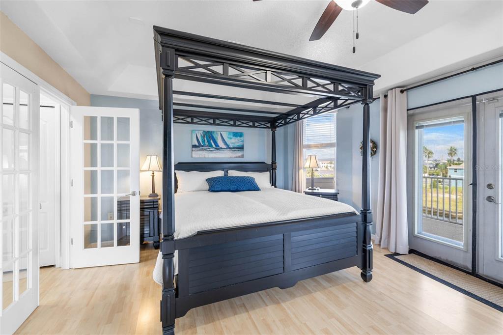 3280 Gulf Winds Circle Hernando Beach, FL 34607 - Photo 36 of 68 a bedroom with a large bed and a window