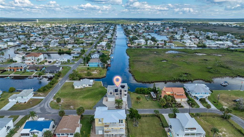 3280 Gulf Winds Circle Hernando Beach, FL 34607 - Photo 61 of 68 an aerial view of residential houses with outdoor space