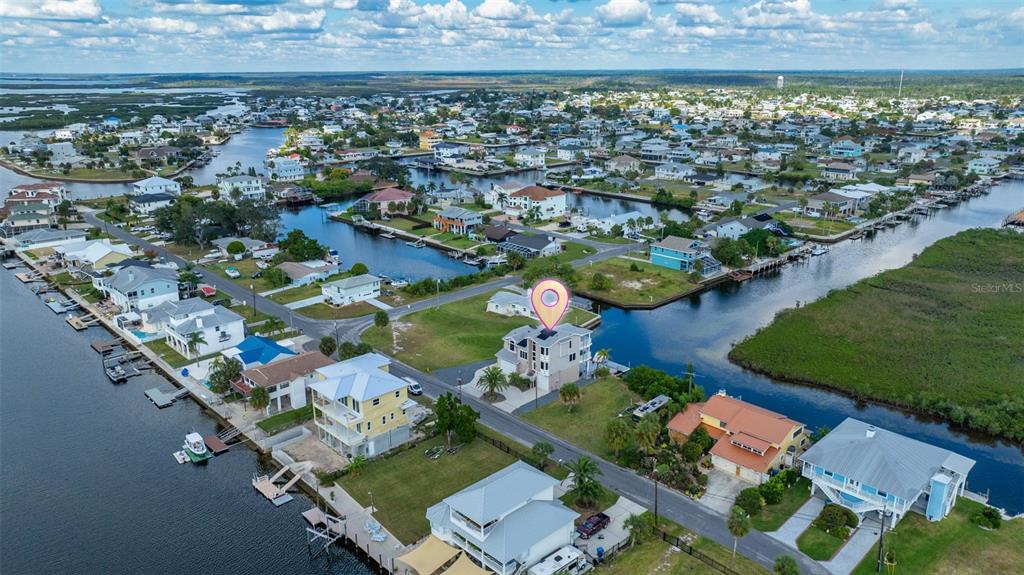 3280 Gulf Winds Circle Hernando Beach, FL 34607 - Photo 67 of 68 an aerial view of multiple house