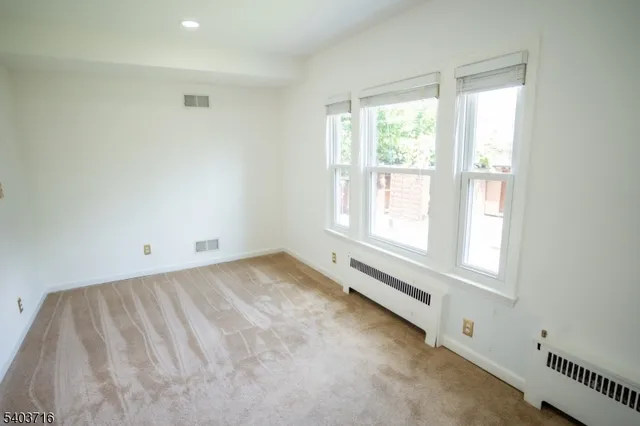 a view of a window in an empty room