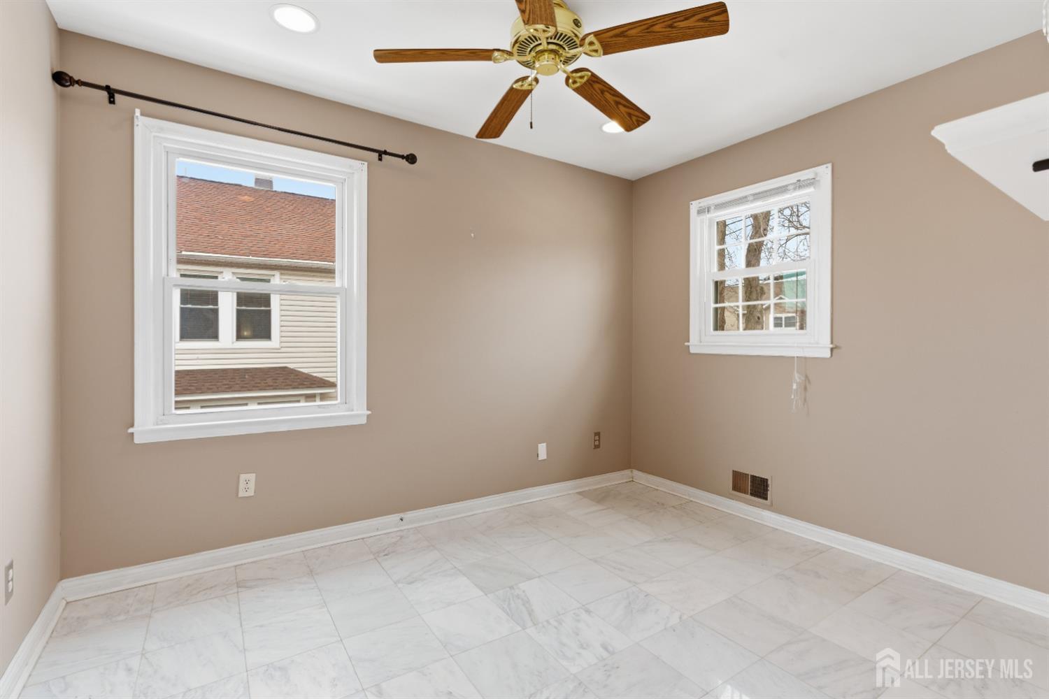6 Cherry Street Edison, NJ 08817 - Photo 15 of 30 a view of an empty room with a window