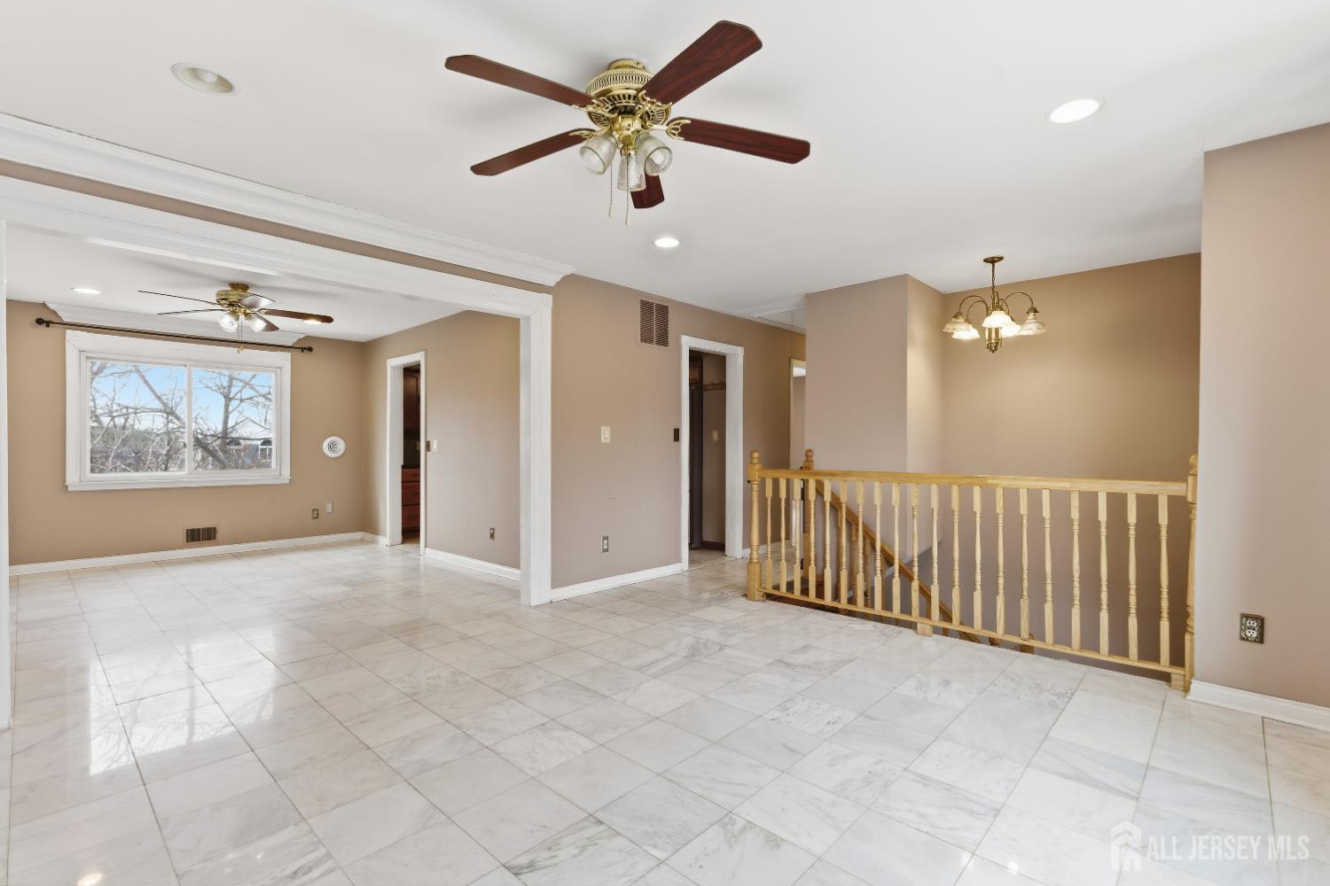 6 Cherry Street Edison, NJ 08817 - Photo 5 of 30 a view of a livingroom with a ceiling fan and window