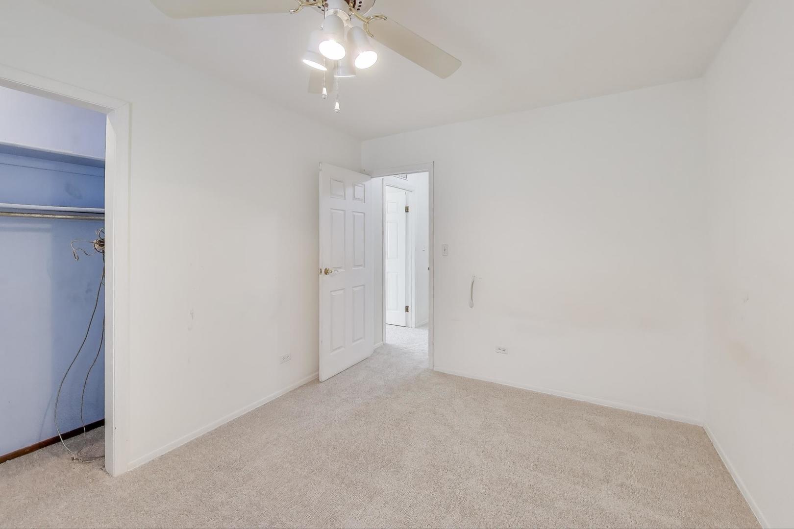 121 South Lancaster Drive Bolingbrook, IL 60440 - Photo 21 of 35 an empty room with a bathroom