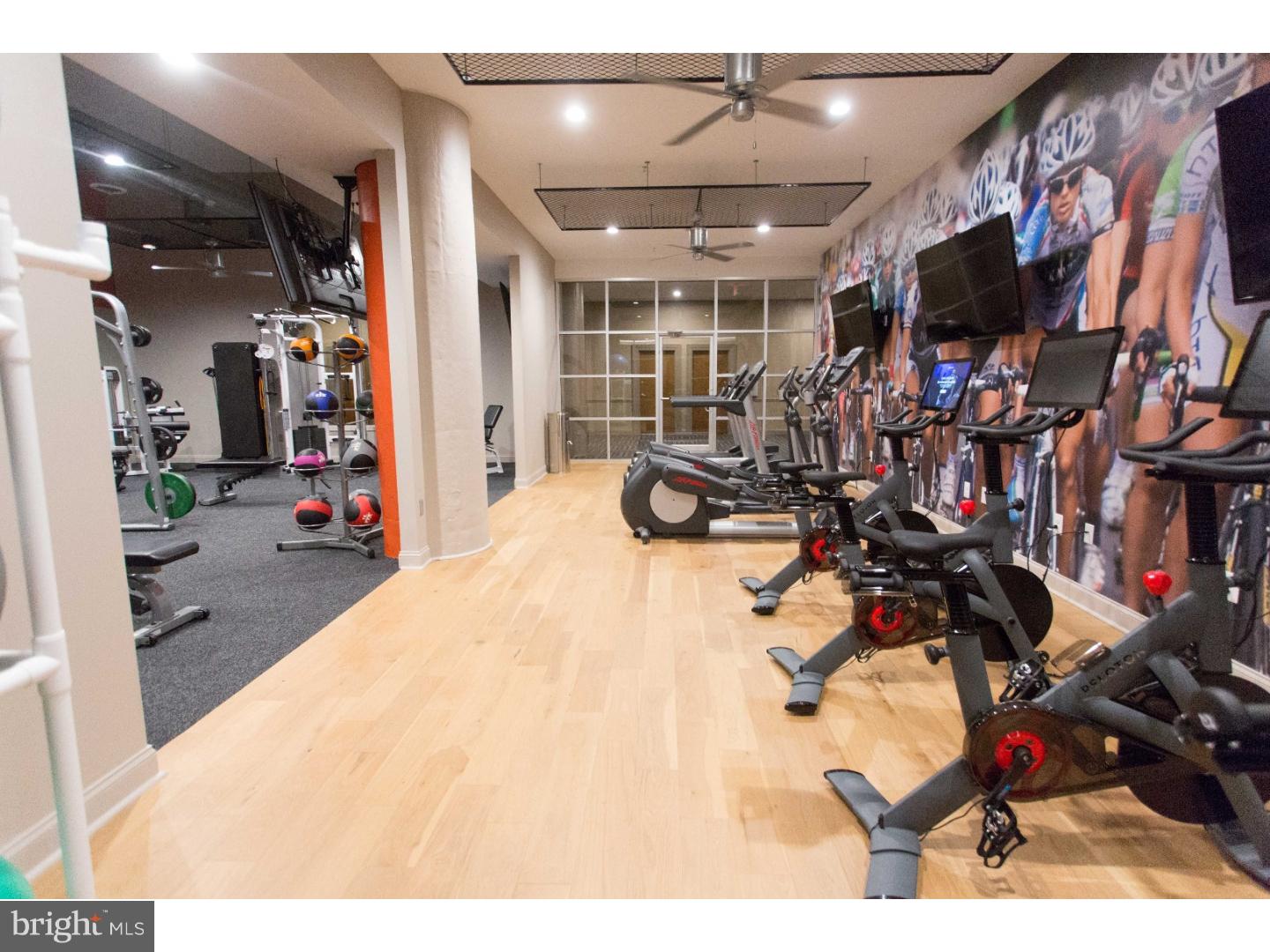 811-1 Filbert Street, Unit 310 Philadelphia, PA 19107 - Photo 10 of 18 a view of a room with gym equipment