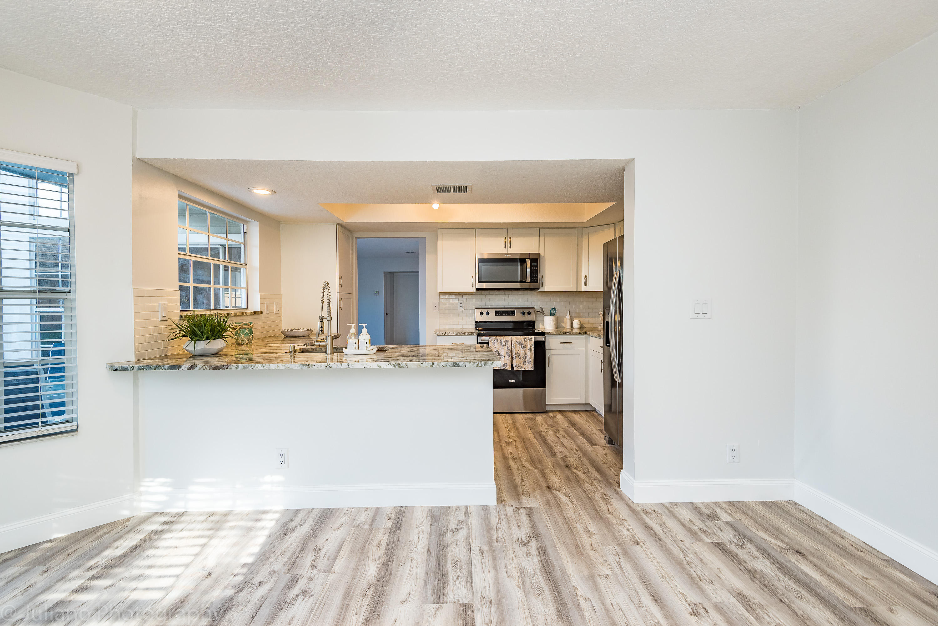 5080 Pointe Alexis Boca Raton, FL 33431 - Photo 8 of 31 Kitchen/Den