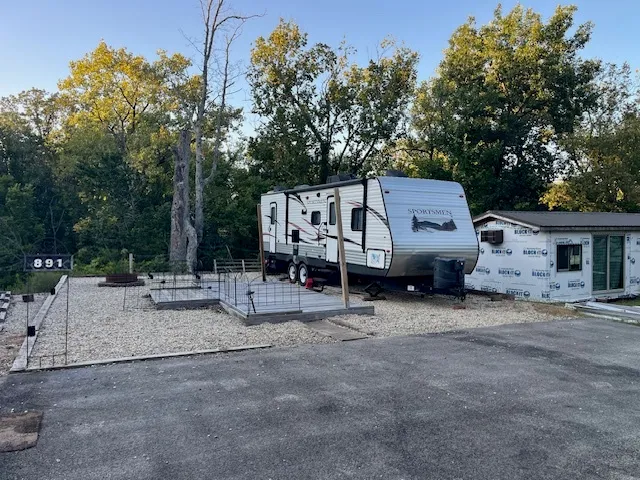a view of a backyard with sitting area