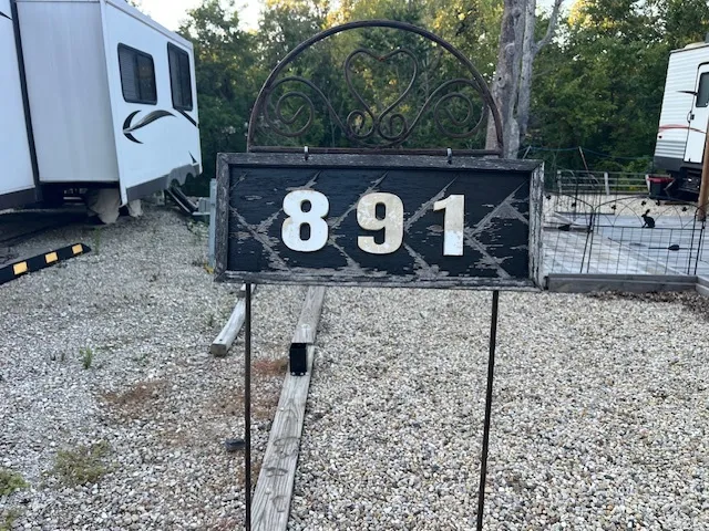 a kitchen with stainless steel appliances granite countertop a refrigerator and a stove