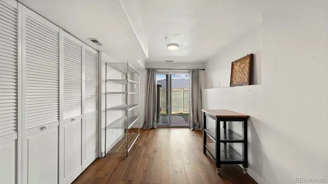 a living room with a couch and a flat screen tv