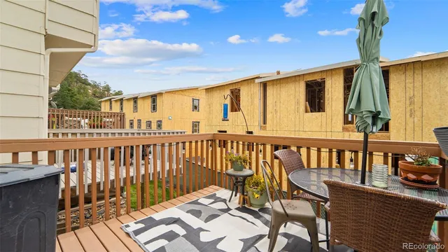 a view of a brick building next to a road