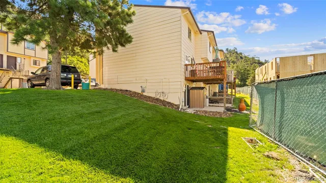 a view of a terrace with a lake view