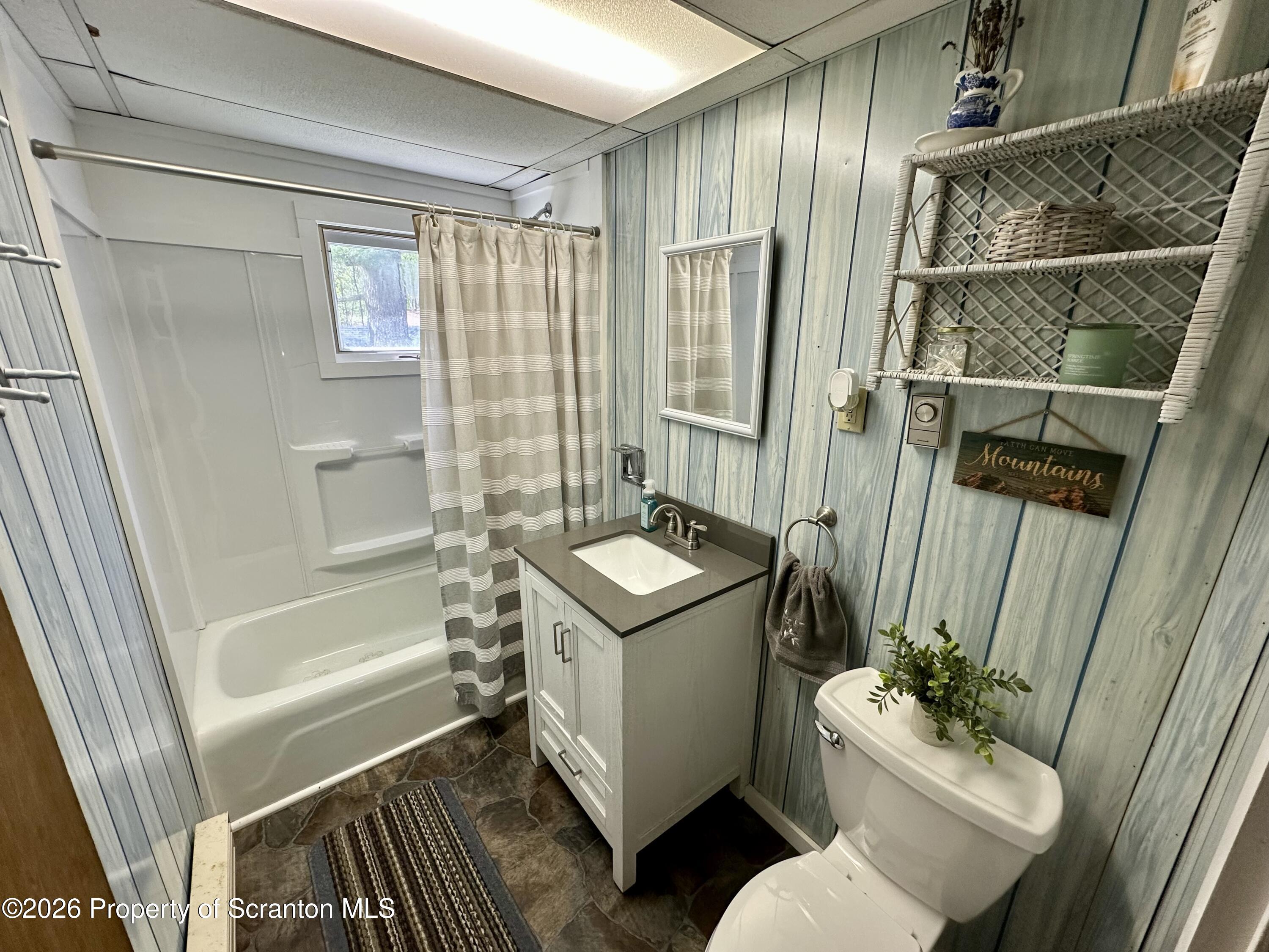130 1st Street Tunkhannock, PA 18657 - Photo 14 of 23 a bathroom with a sink toilet and shower