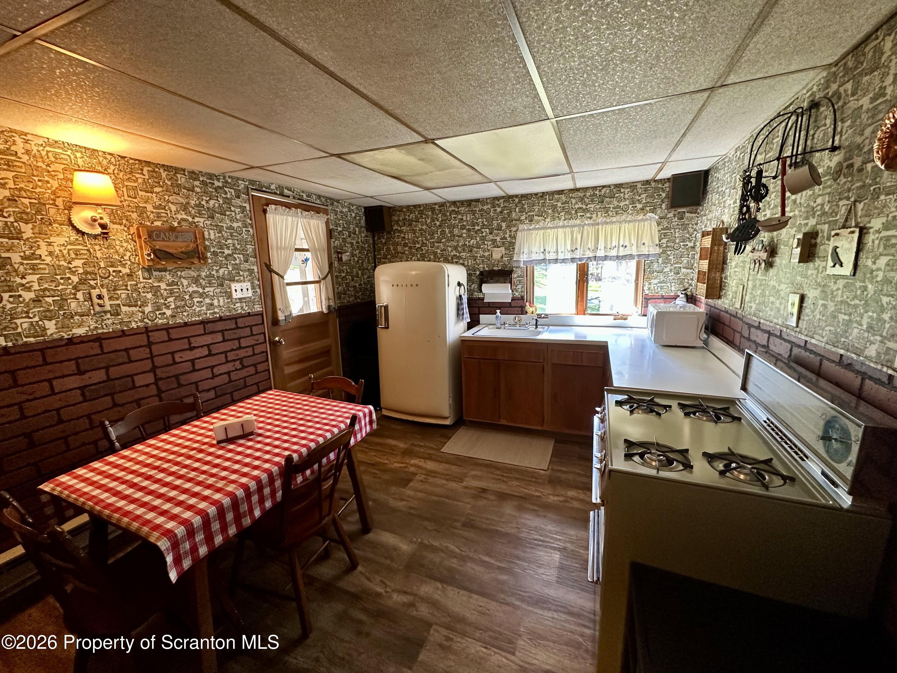 130 1st Street Tunkhannock, PA 18657 - Photo 17 of 23 a bedroom with furniture and wooden floor