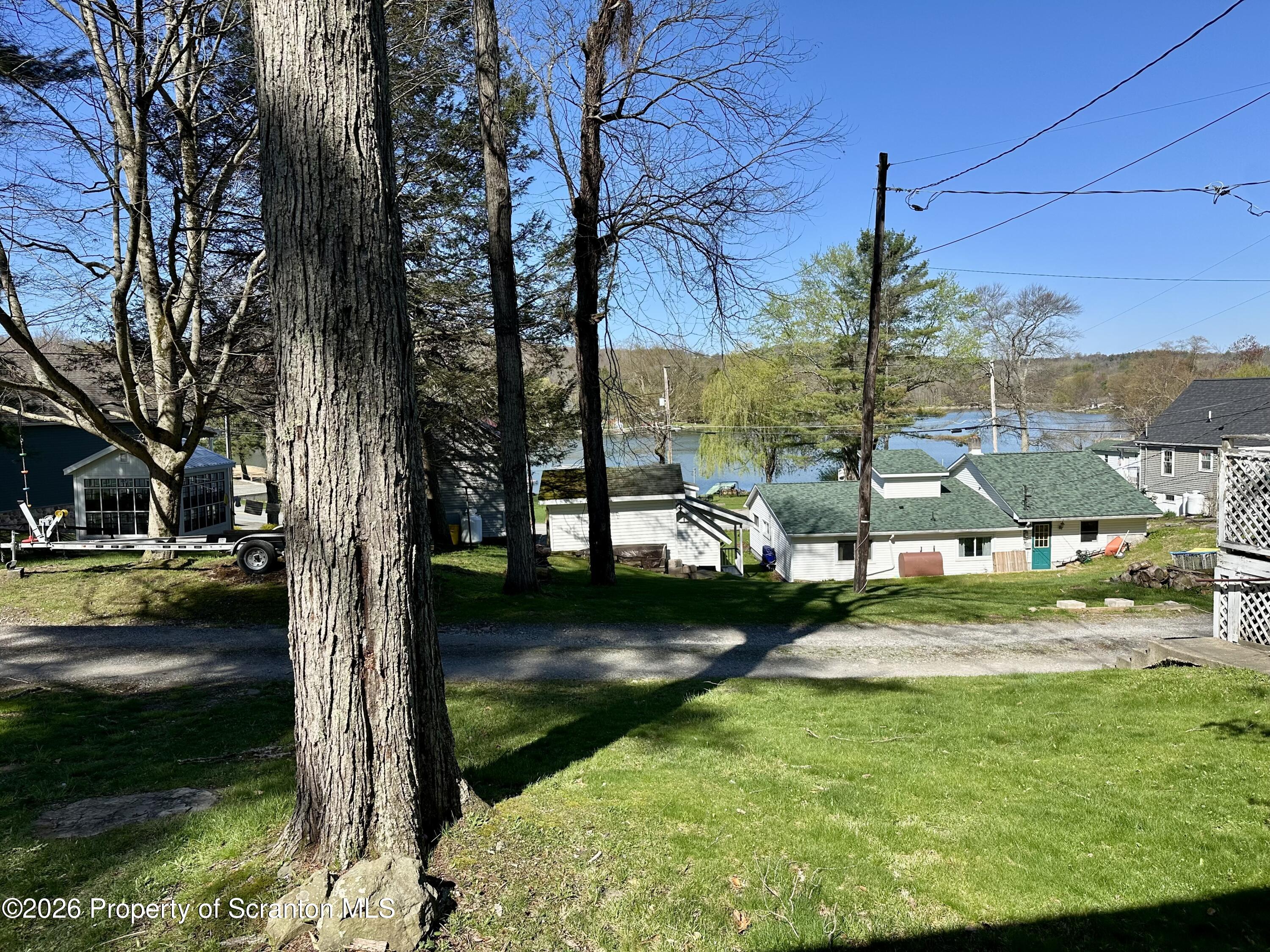 130 1st Street Tunkhannock, PA 18657 - Photo 19 of 23 a view of a park with large trees