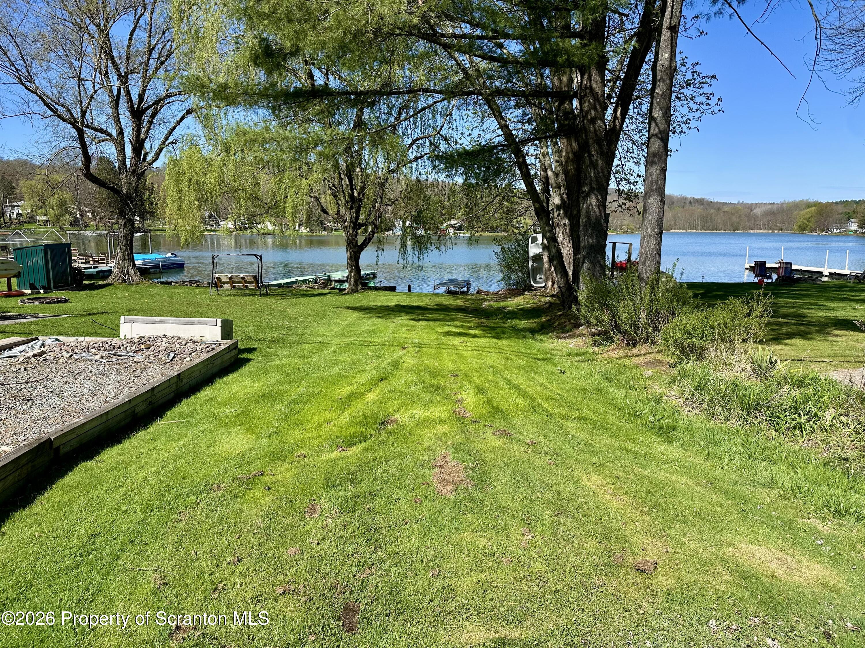 130 1st Street Tunkhannock, PA 18657 - Photo 21 of 23 a view of a yard with a tree