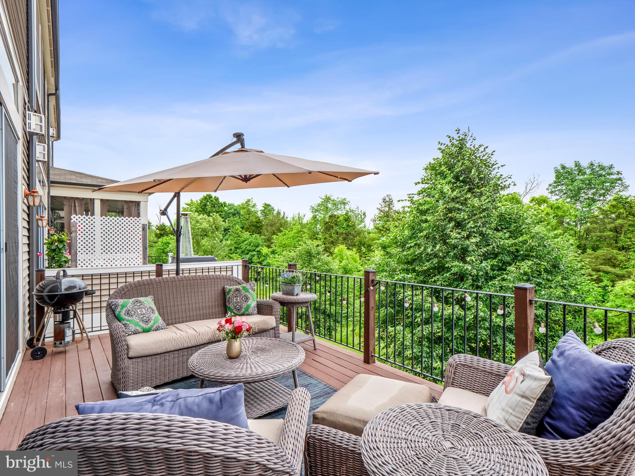 23366 Evening Primrose Square Brambleton, VA 20148 - Photo 11 of 28 a outdoor living space with furniture and city view