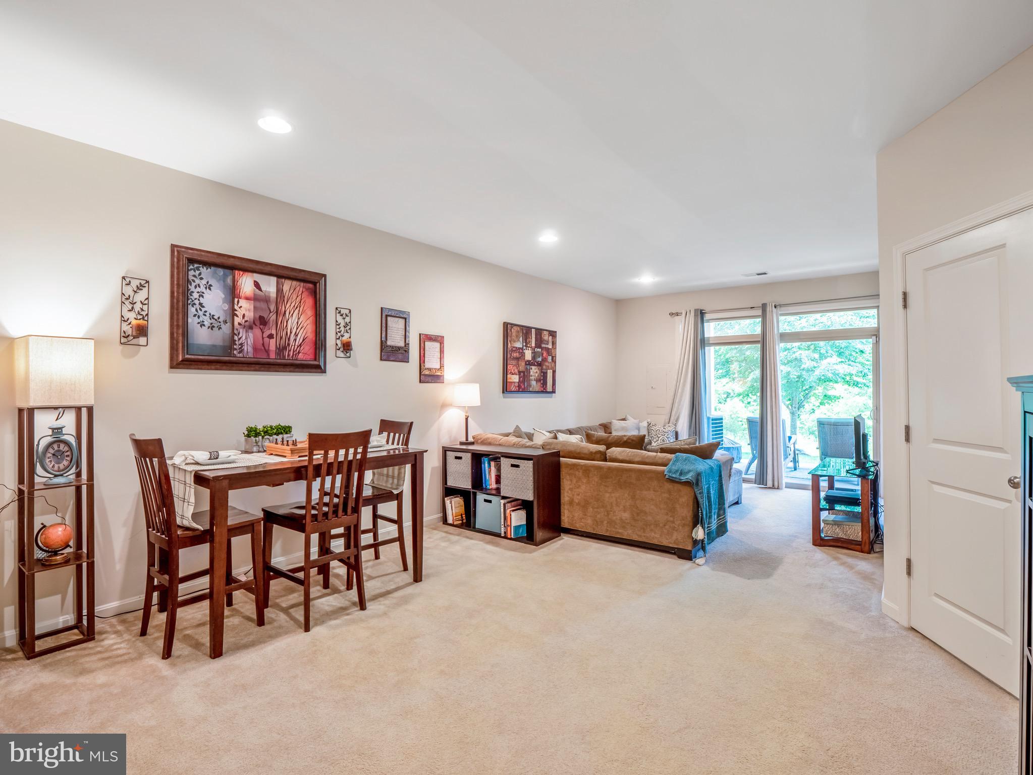 23366 Evening Primrose Square Brambleton, VA 20148 - Photo 24 of 28 a living room with furniture and large window