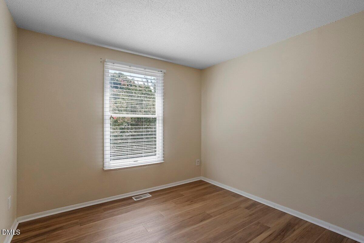 7733 Ohmann Court Raleigh, NC 27615 - Photo 23 of 27