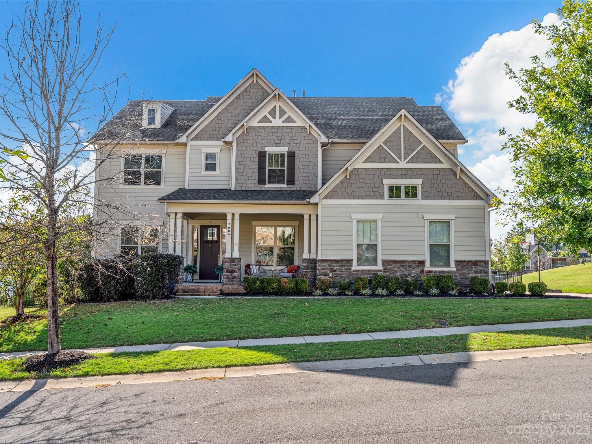 7009 Fallondale Road Waxhaw, NC 28173 - Photo 1 of 47 a front view of a house with a yard