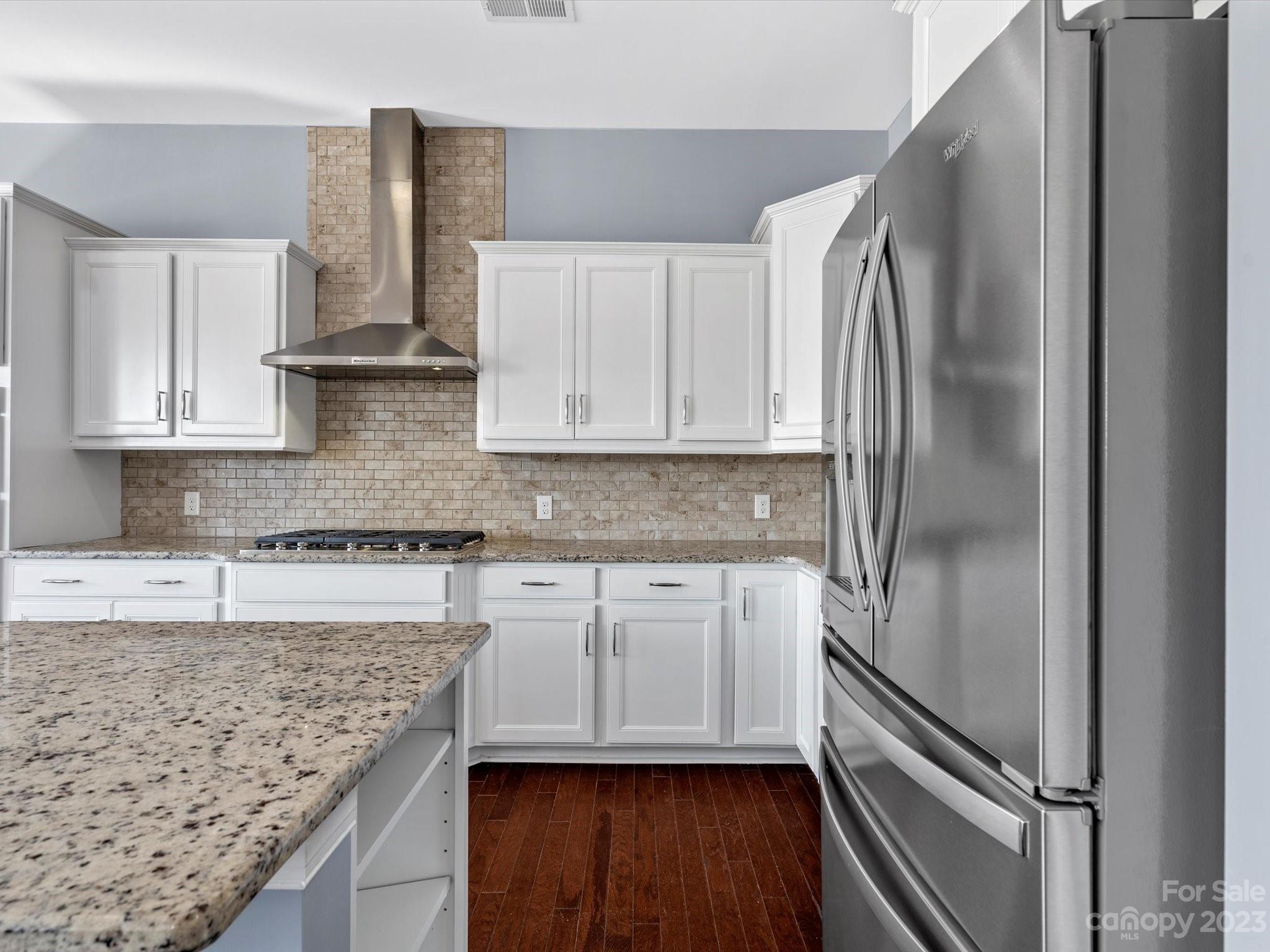 7009 Fallondale Road Waxhaw, NC 28173 - Photo 22 of 47 a kitchen with a refrigerator sink and cabinets