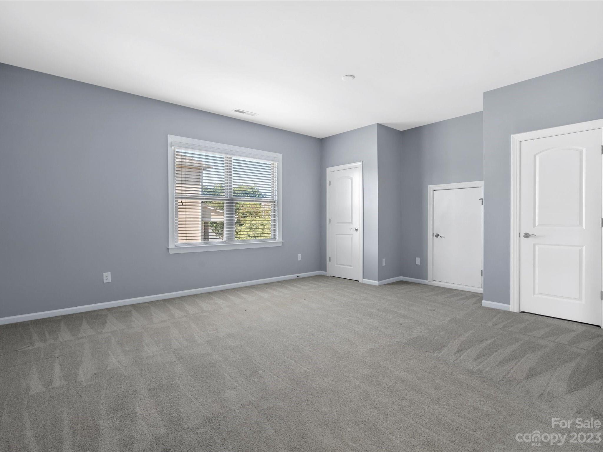 7009 Fallondale Road Waxhaw, NC 28173 - Photo 27 of 47 an empty room with windows