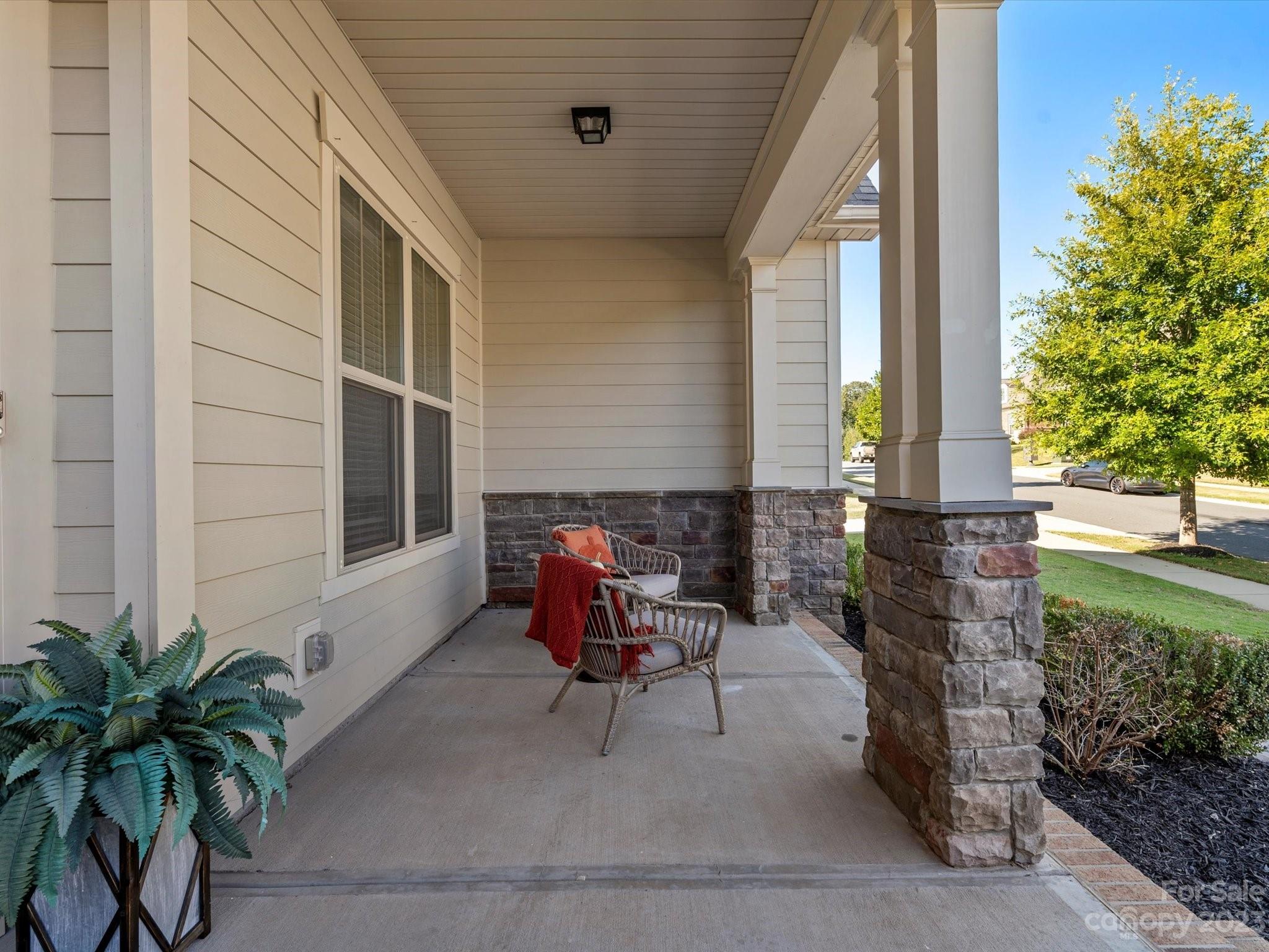 7009 Fallondale Road Waxhaw, NC 28173 - Photo 44 of 47 a backyard of a house with outdoor seating