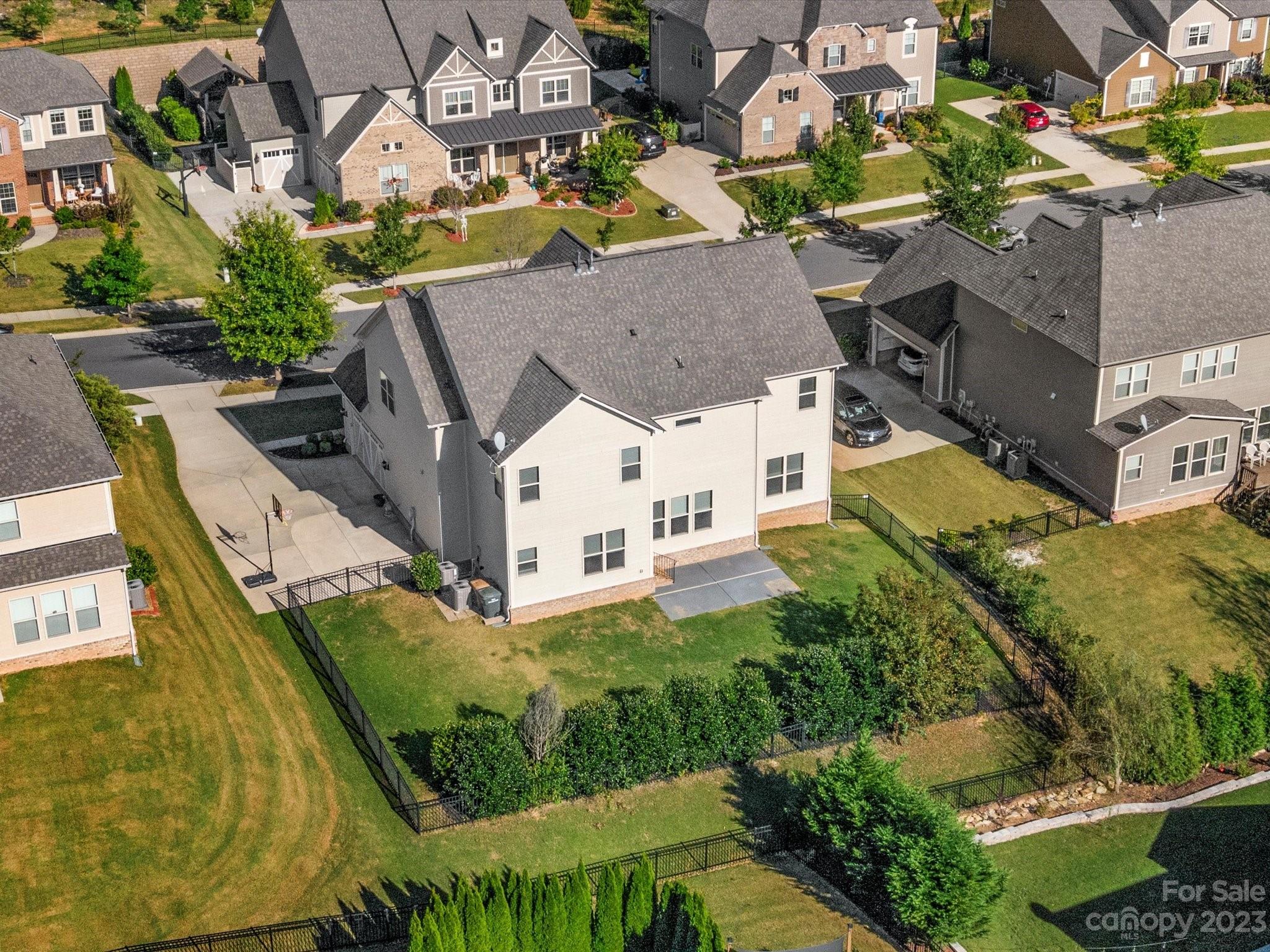 7009 Fallondale Road Waxhaw, NC 28173 - Photo 46 of 47 an aerial view of residential houses with outdoor space