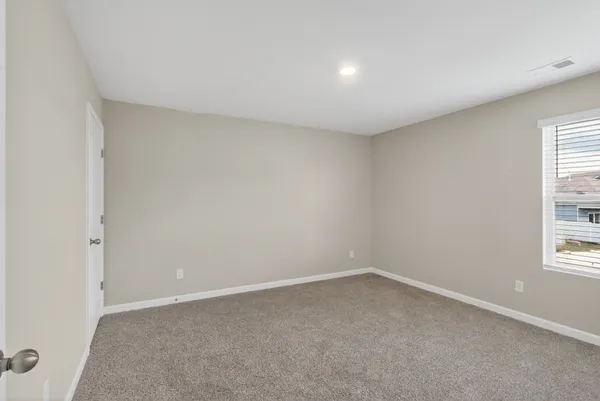 a view of hallway with white walls